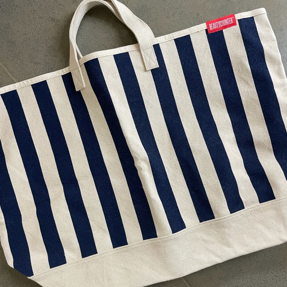 Oversided navy/white striped BEAUTYCOUNTER canvas tote